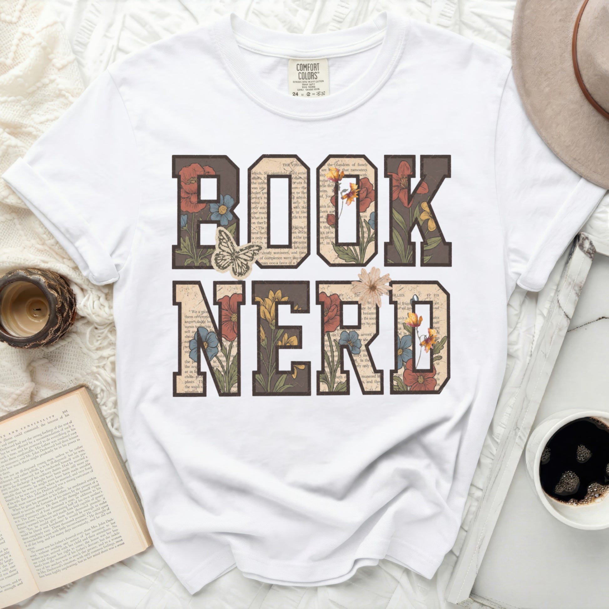 T-shirt with "BOOK NERD" in floral letter blocks.