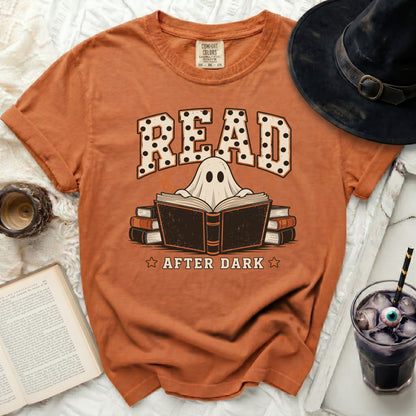 Orange t-shirt with "READ AFTER DARK" text and a ghost reading a book.