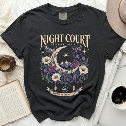 Black t-shirt with "Night Court Botanical Society" and "Bloom by Moonlight" graphic.