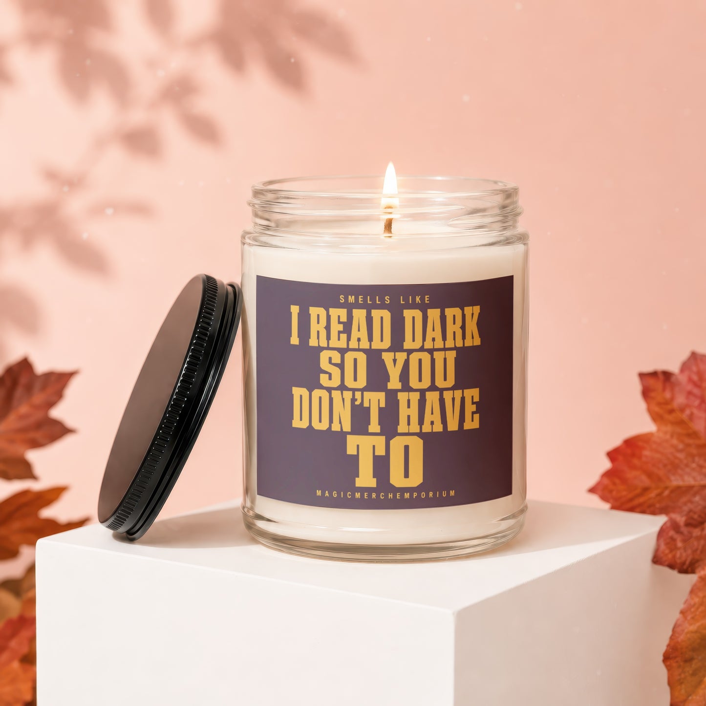 Candle with text "Smells like I Read Dark So You Don't Have To".
