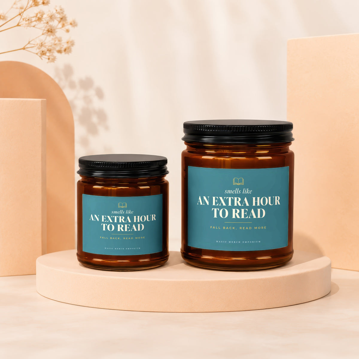 Two amber candles with teal labels that read "An Extra Hour To Read".