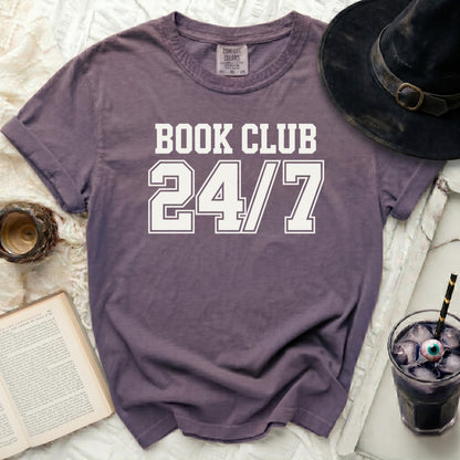 Comfort Colors shirt with "BOOK CLUB 24/7" text, styled with witchy props.