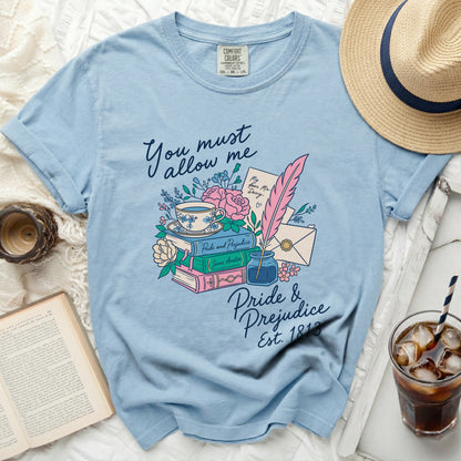 Light blue t-shirt with "Pride & Prejudice Est. 1813" floral graphic.