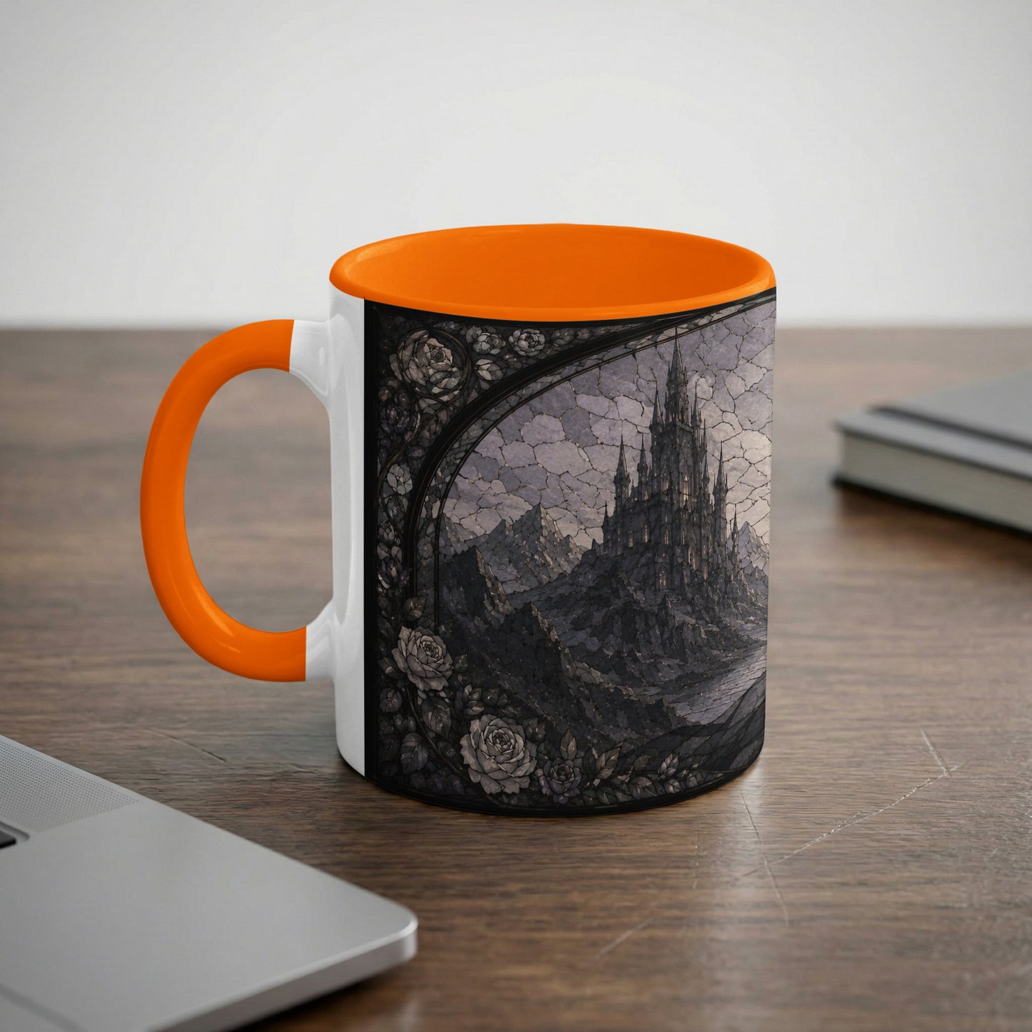 White mug with orange handle featuring a gothic castle and roses design.