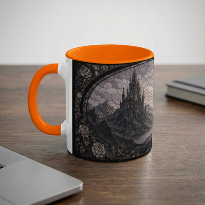 White mug with orange handle featuring a gothic castle and roses design.
