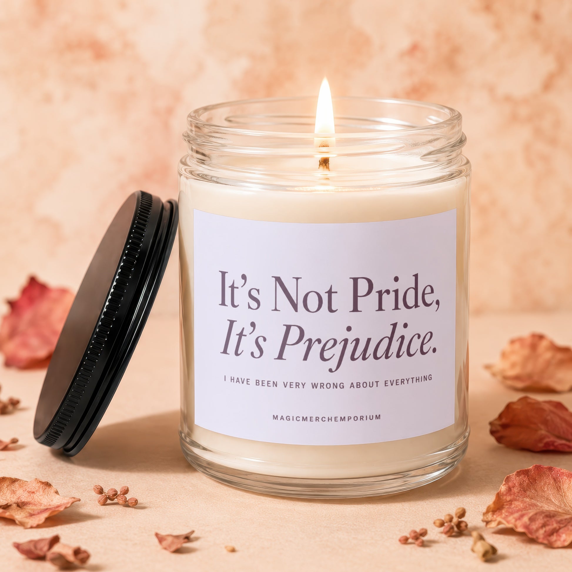Candle with text "It's Not Pride, It's Prejudice." and "MAGICMERCHEMPORIUM."
