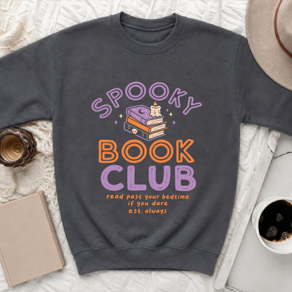 Dark gray sweatshirt with "Spooky Book Club" text and stacked books graphic.