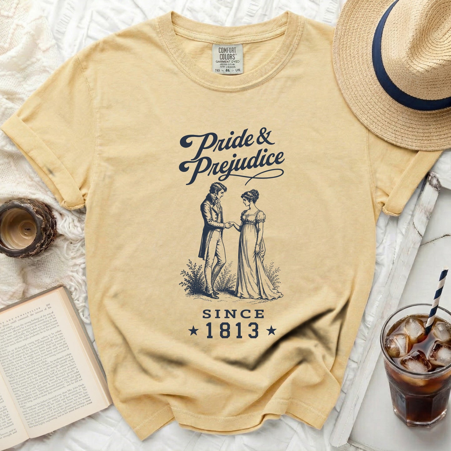 Yellow t-shirt with "Pride & Prejudice Since 1813" graphic.