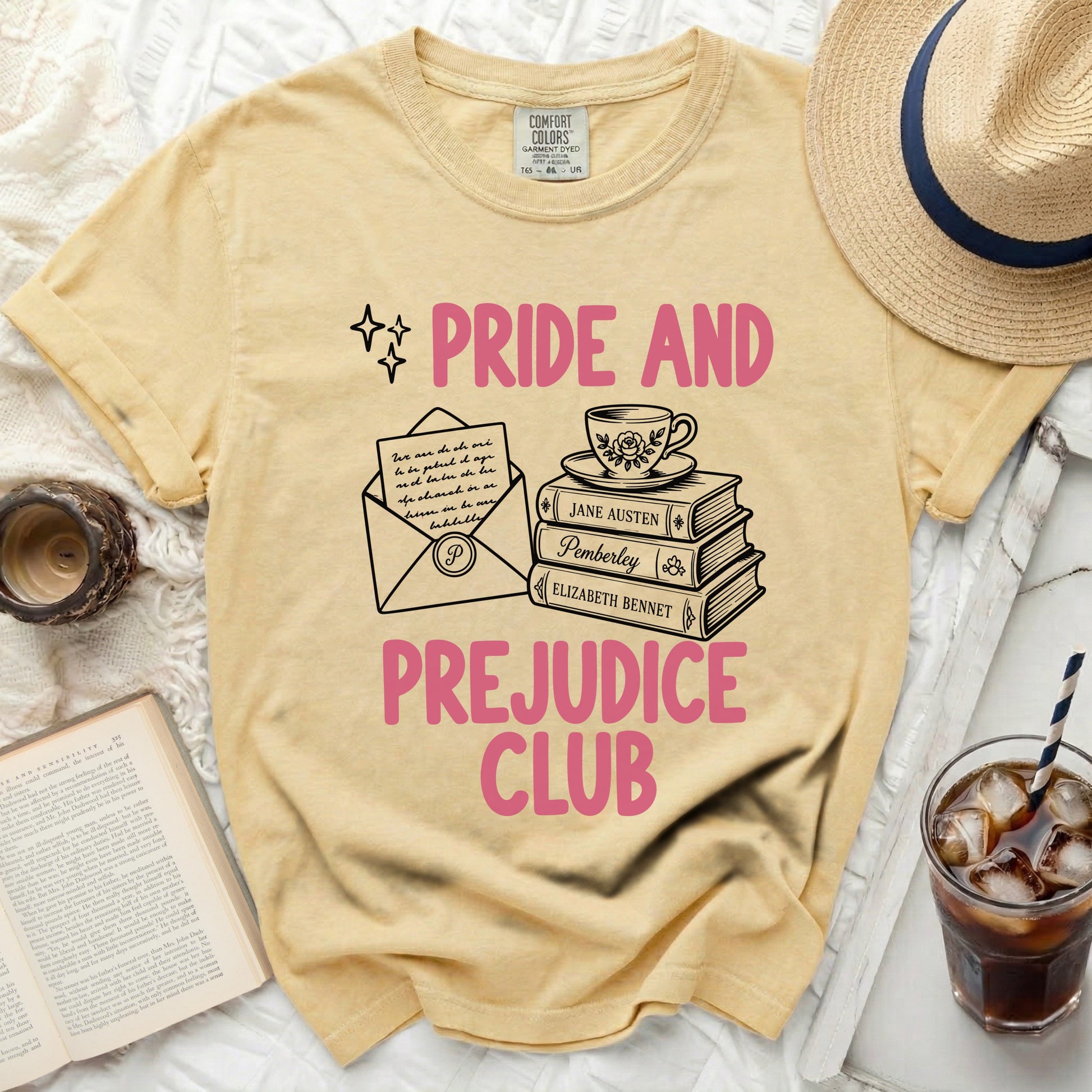 Yellow t-shirt with "Pride and Prejudice Club" text and book graphics.