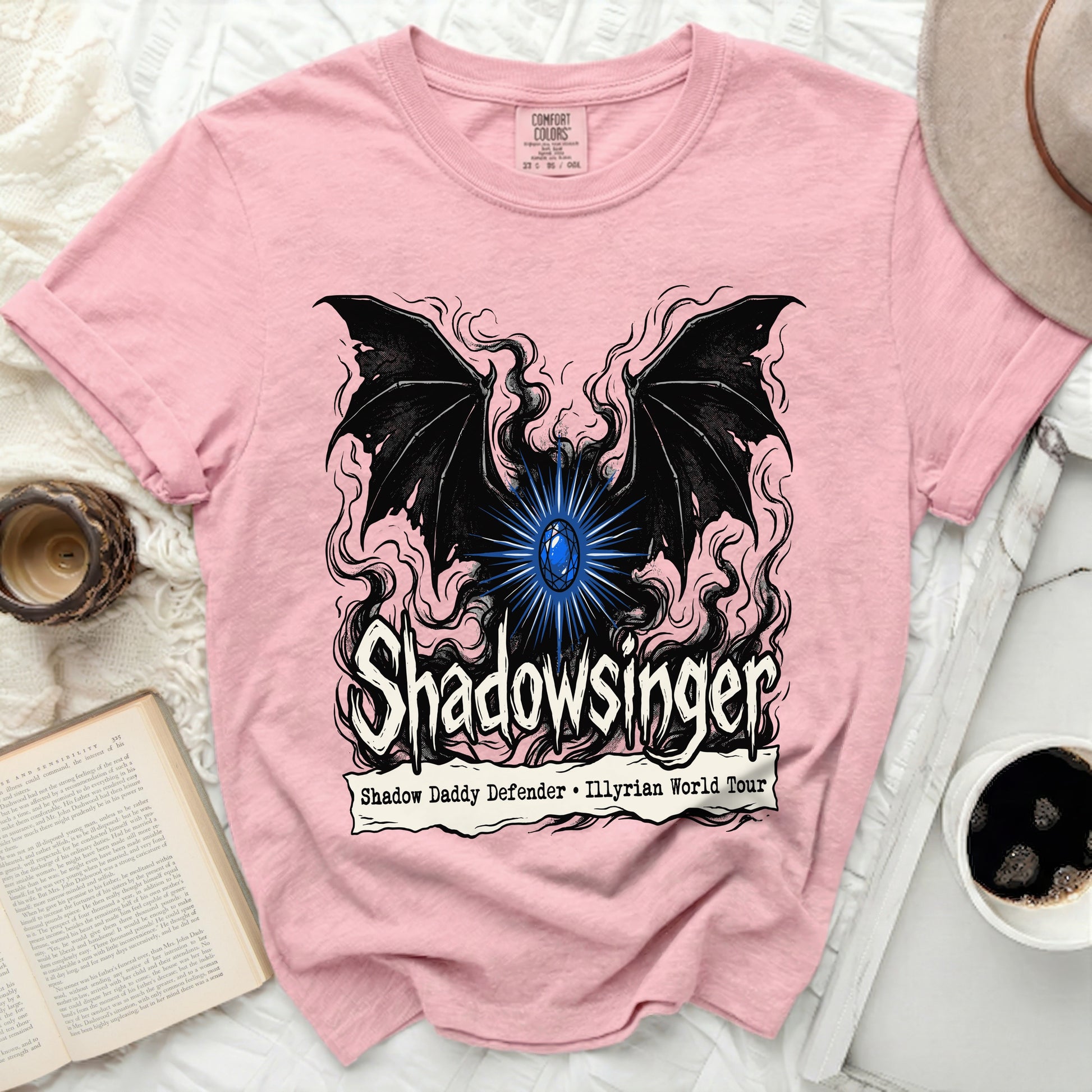 Pink t-shirt with "Shadowsinger Shadow Daddy Defender Illyrian World Tour" graphic.