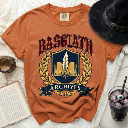 Orange t-shirt with "Basgiath Archives" crest featuring an open book and quill.