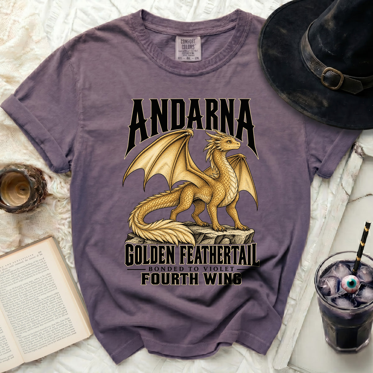 Andarna dragon graphic t-shirt with text "Golden Feathertail" and "Fourth Wing".