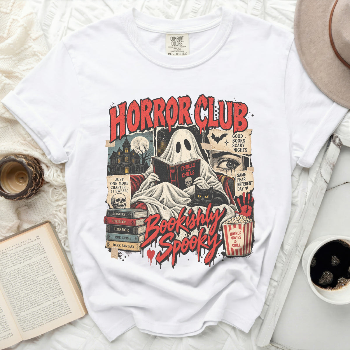White t-shirt with "Horror Club Bookishly Spooky" graphic featuring a ghost reading.