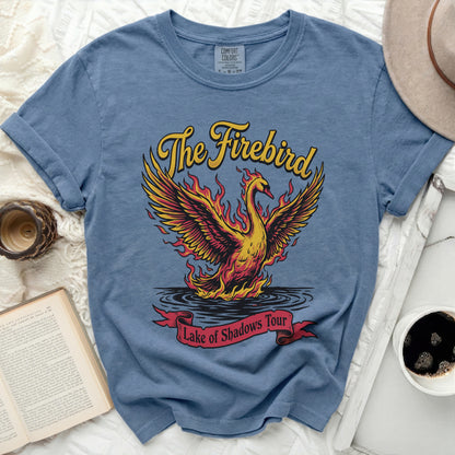 Blue t-shirt with "The Firebird Lake of Shadows Tour" graphic.