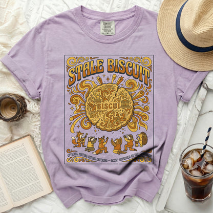 Lavender t-shirt with "Stale Biscuit Official Mating Ritual Offering" graphic.