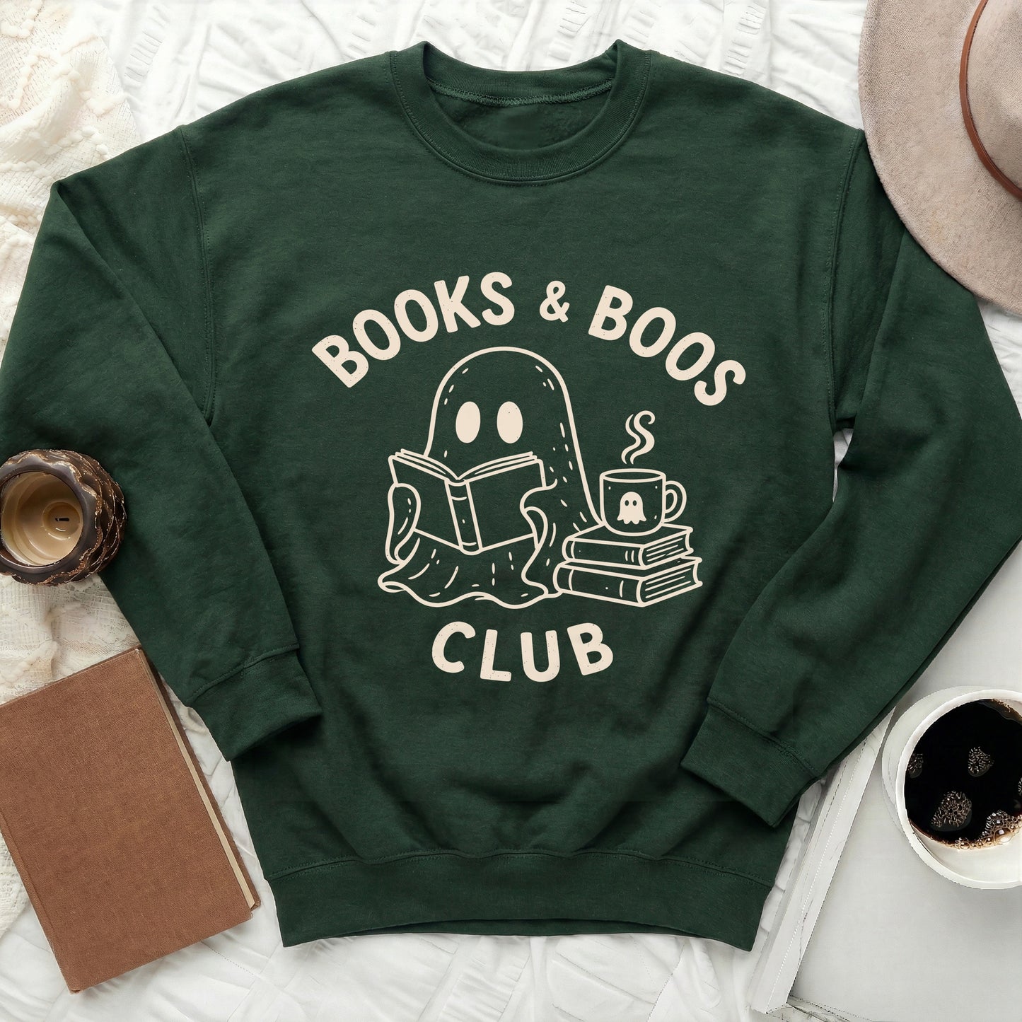 Green sweatshirt with "Books & Boos Club" text and a reading ghost graphic.