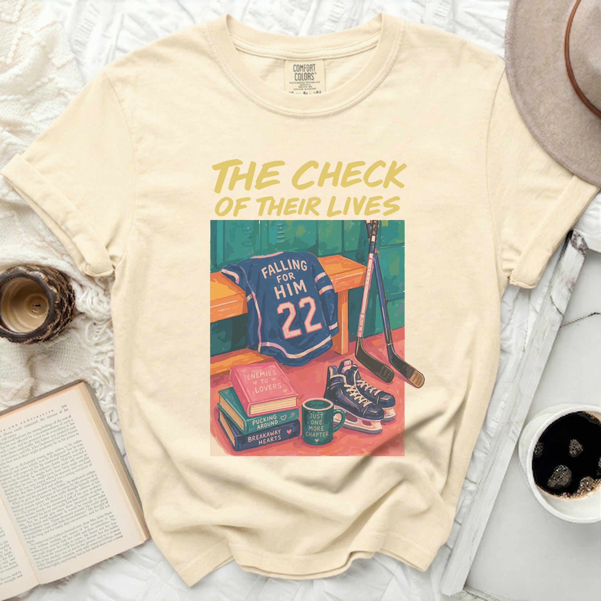 Comfort Colors cream t-shirt with "The Check of Their Lives" and hockey graphics.