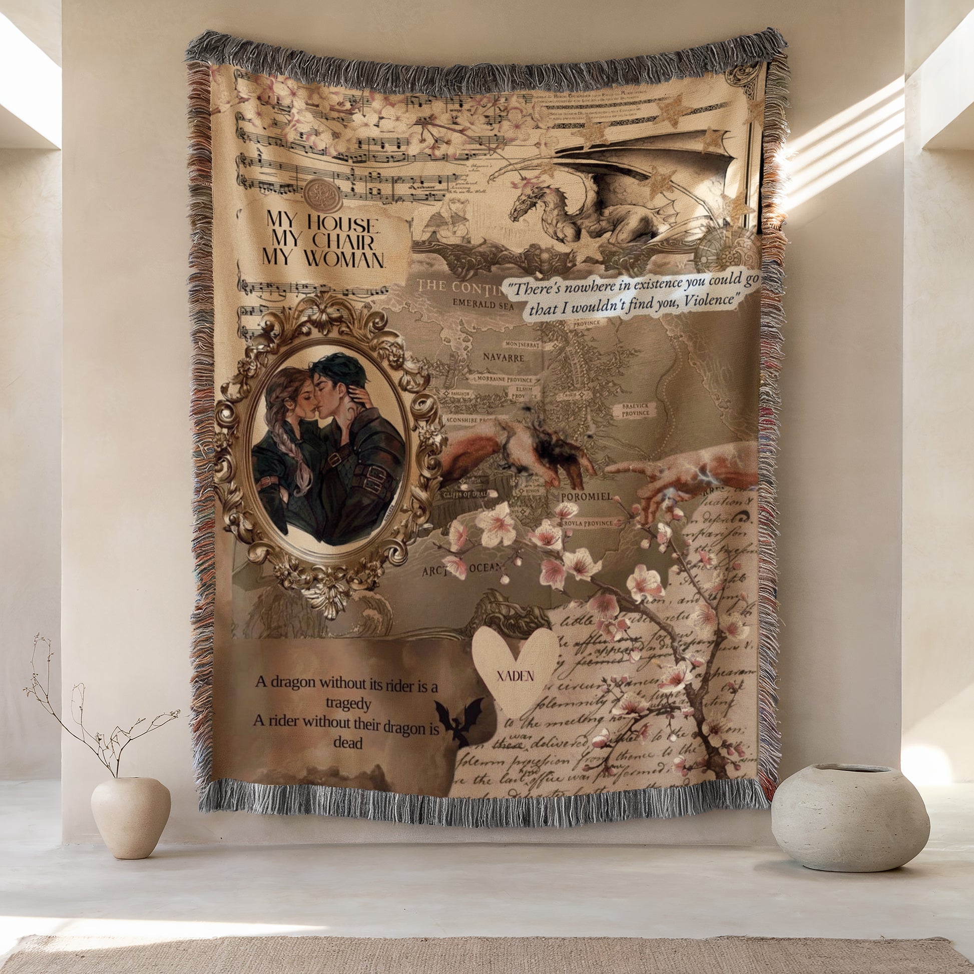 a large tapestry hanging on a wall, with various decorative elements such as a dragon, flowers, and a couple embracing. The tapestry also includes text and imagery related to the story of "A dragon without its rider is a tragedy. A rider without their dragon is dead."