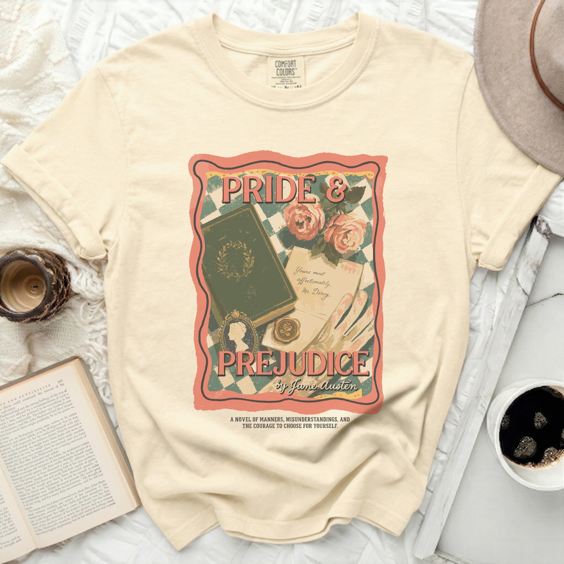 Cream t-shirt with Pride and Prejudice by Jane Austen book cover design.