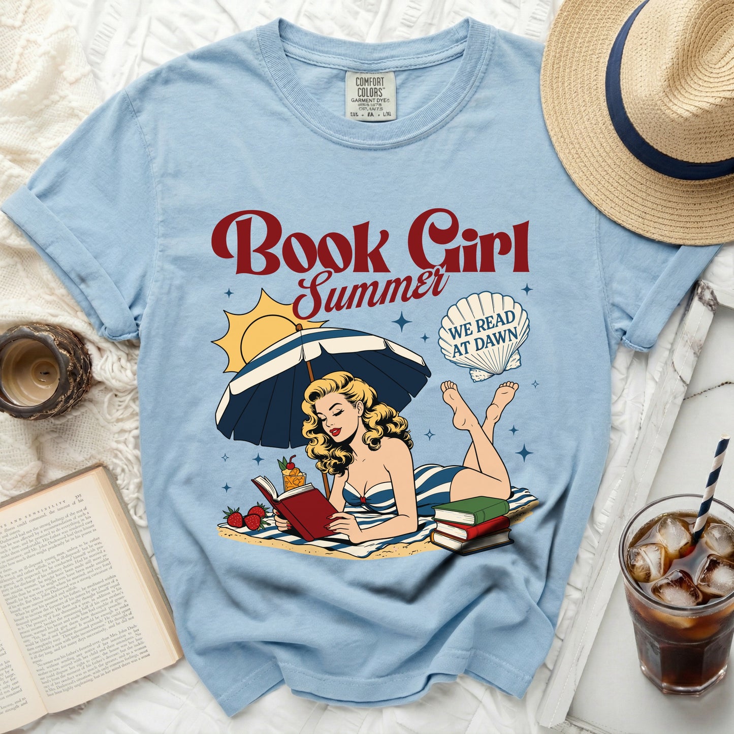 Light blue t-shirt with "Book Girl Summer" design and bathing woman.