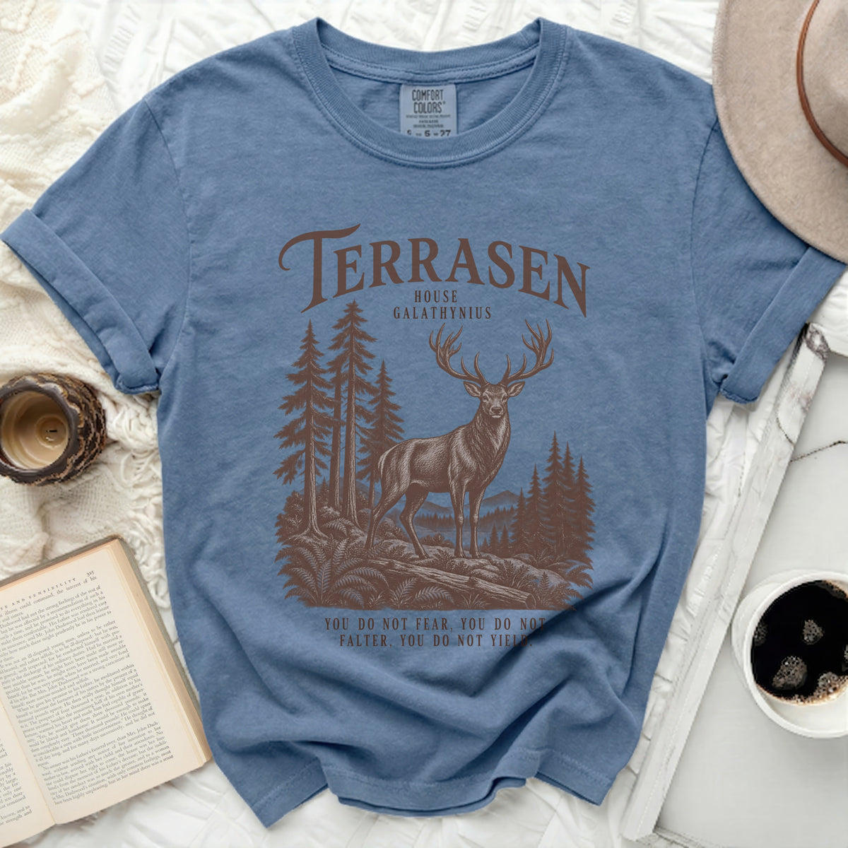 Blue t-shirt with "Terrasen House Galathynius" and a stag in a forest.