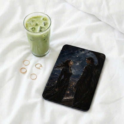 Tablet case with fantasy art of winged man and woman over city at night.