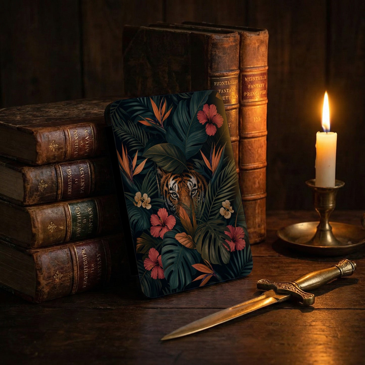 Tiger amidst tropical foliage on a dark background with antique books.