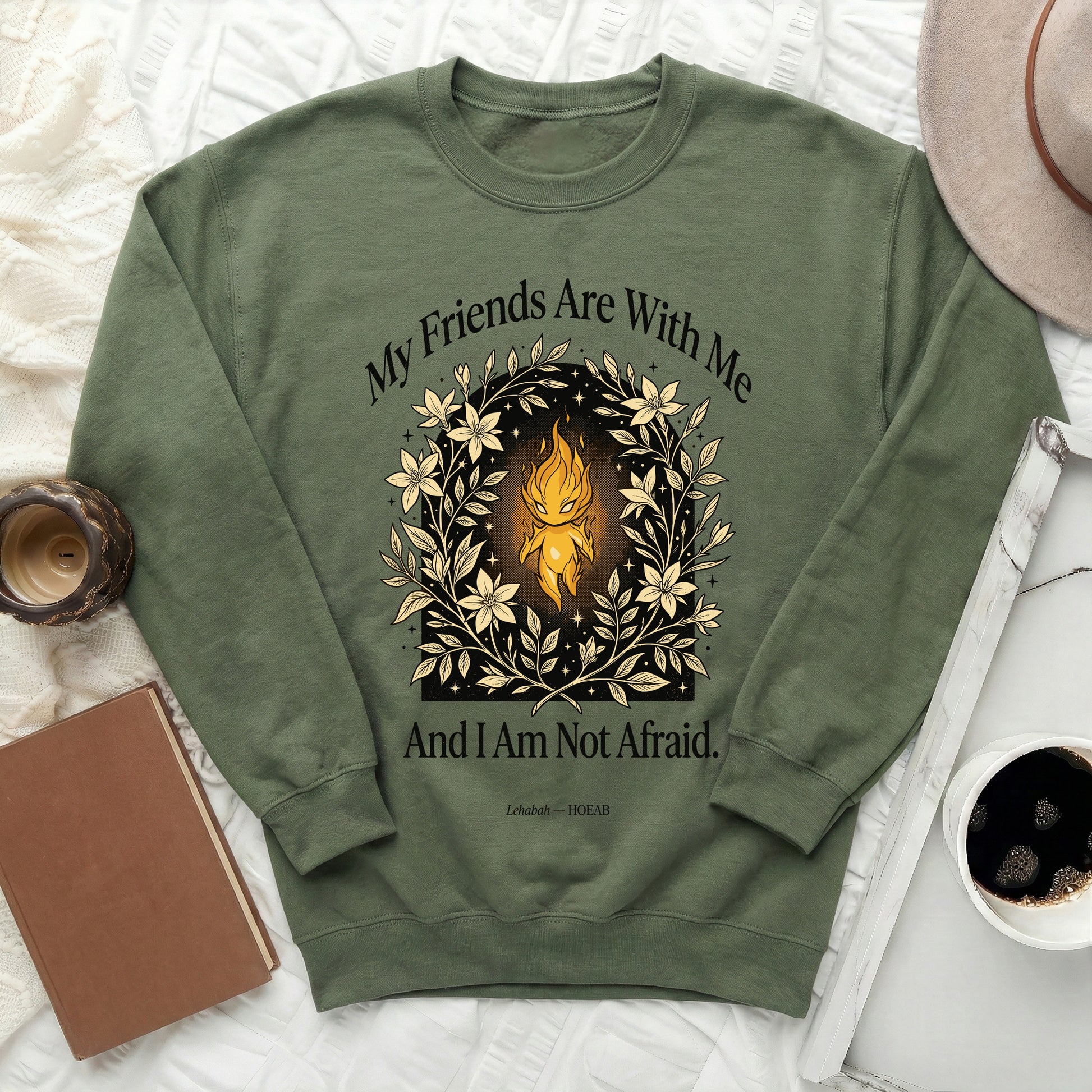 Green sweatshirt with floral wreath and text "My Friends Are With Me And I Am Not Afraid."