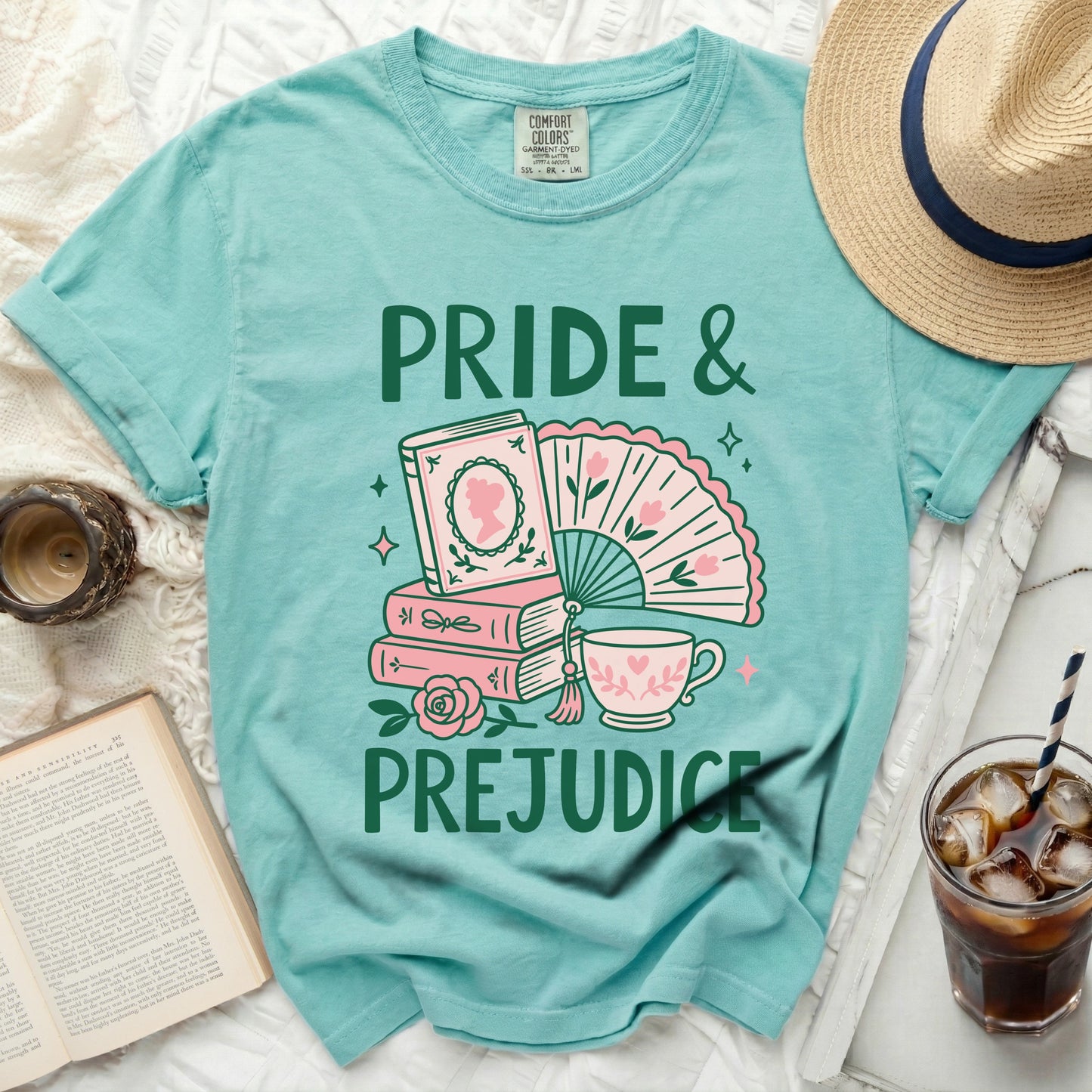 Turquoise t-shirt with "Pride & Prejudice" book and fan graphic.