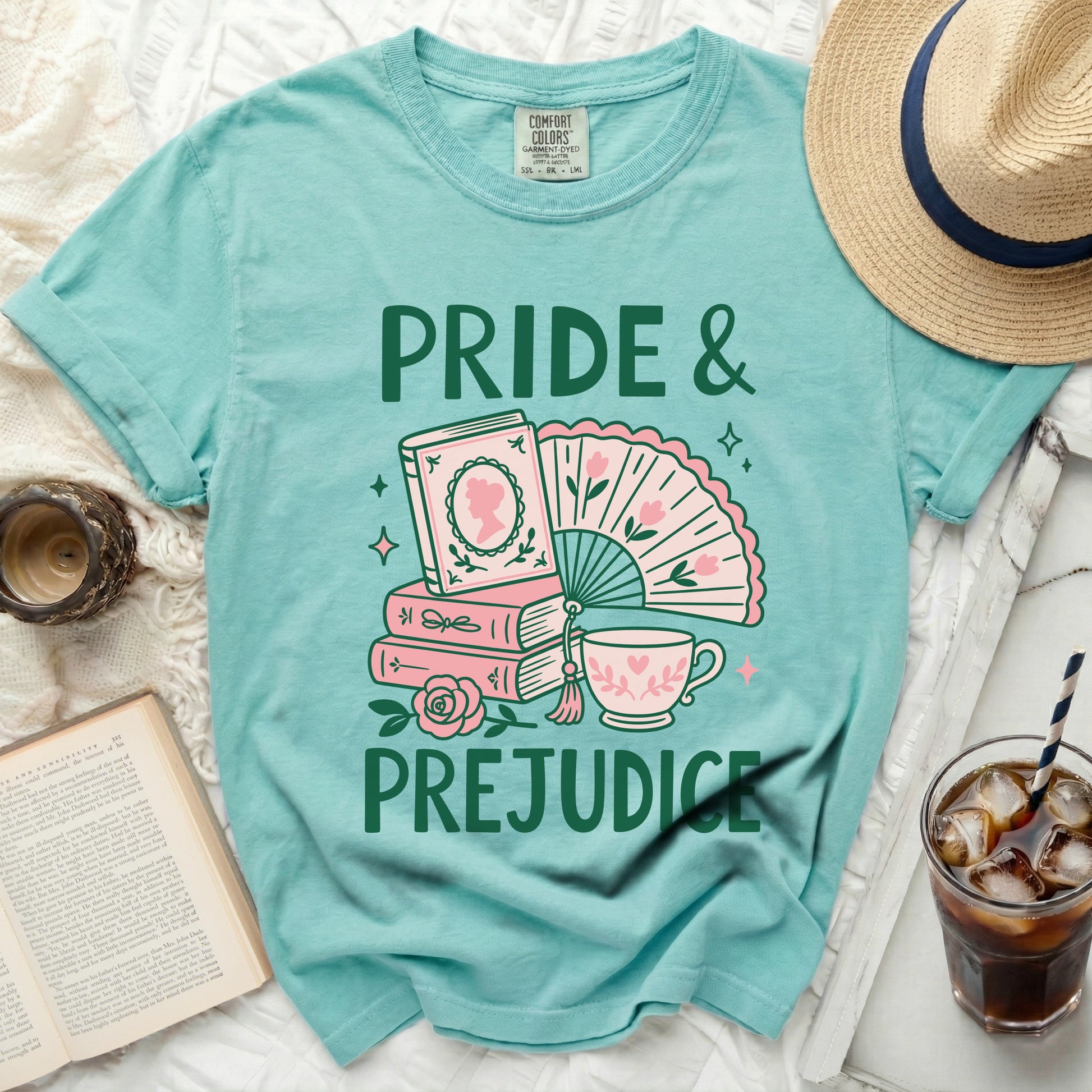 Turquoise t-shirt with "Pride & Prejudice" book and fan graphic.