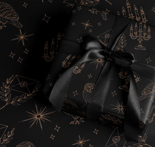 Elegant Black Gift Wrap with Magical Design Elements