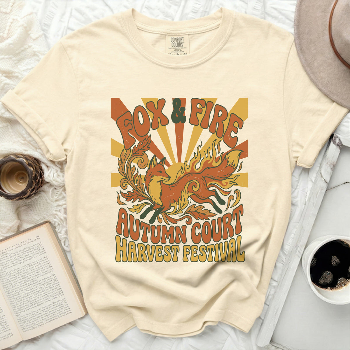 Cream t-shirt with "Fox & Fire Autumn Court Harvest Festival" retro graphic.