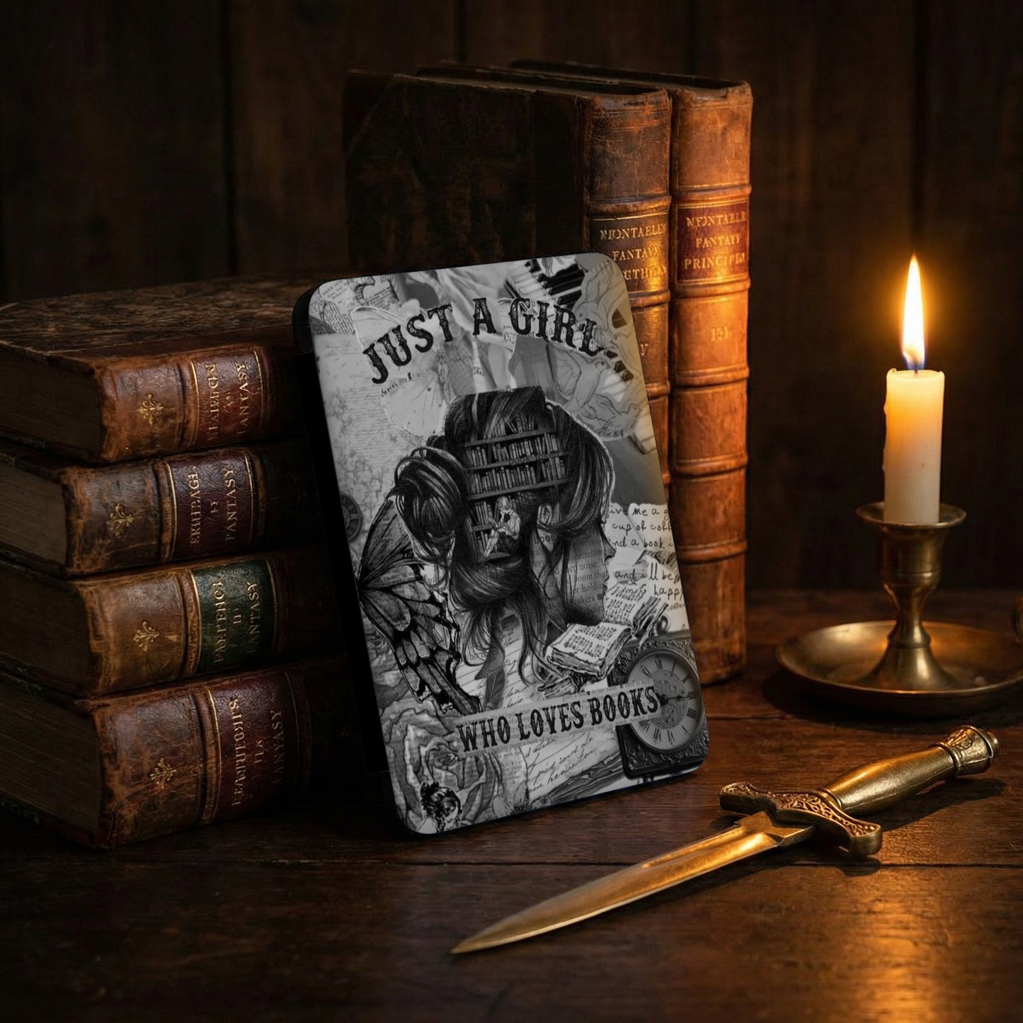 "Just A Girl Who Loves Books" graphic on a surface with stacked antique books and a candle.