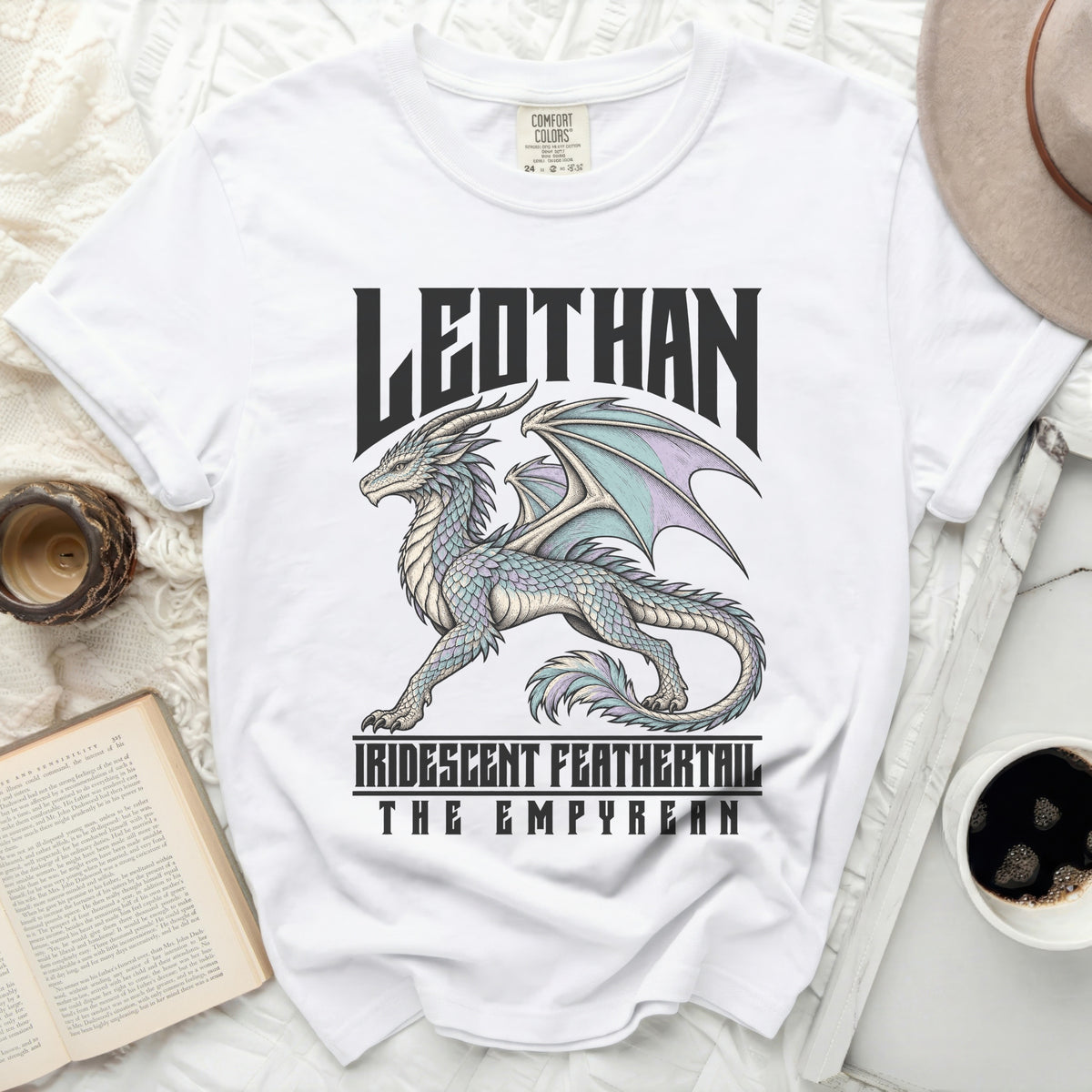 White t-shirt with "LEDTHAN IRIDESCENT FEATHERTAIL THE EMPYREAN" and dragon design.