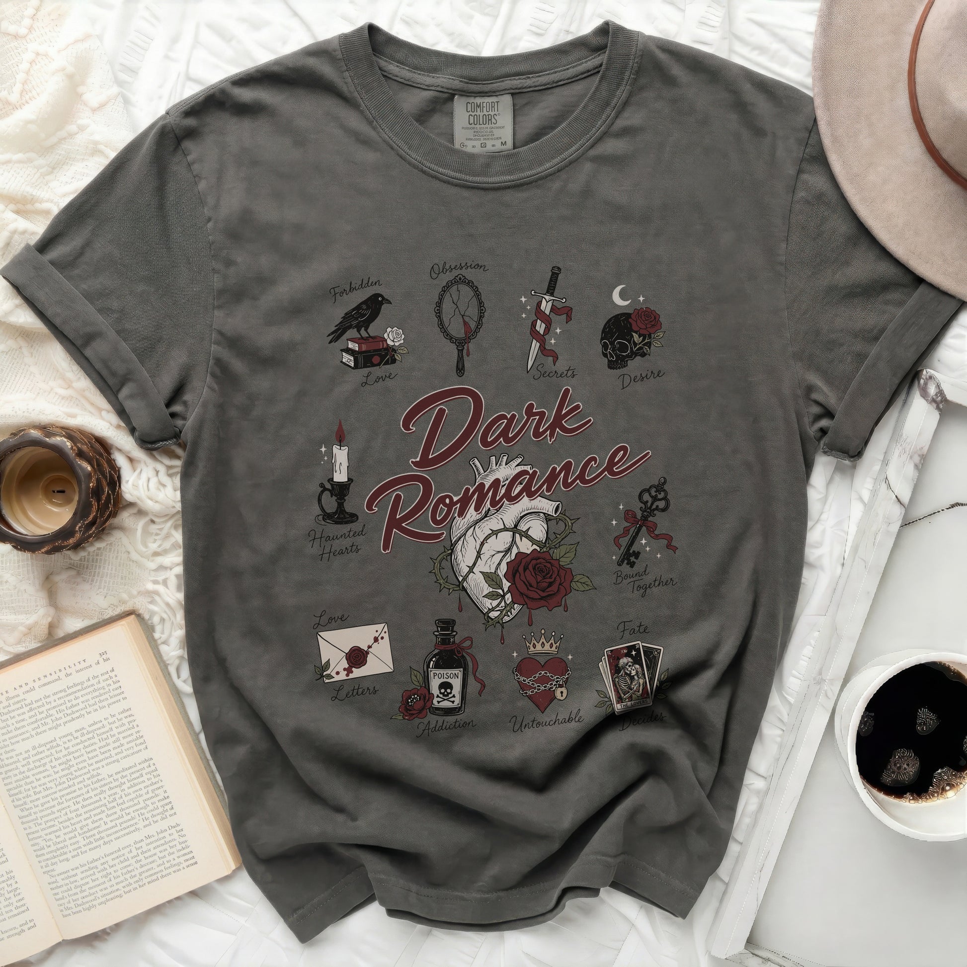 Dark Romance graphic t-shirt with gothic-inspired illustrations and text.
