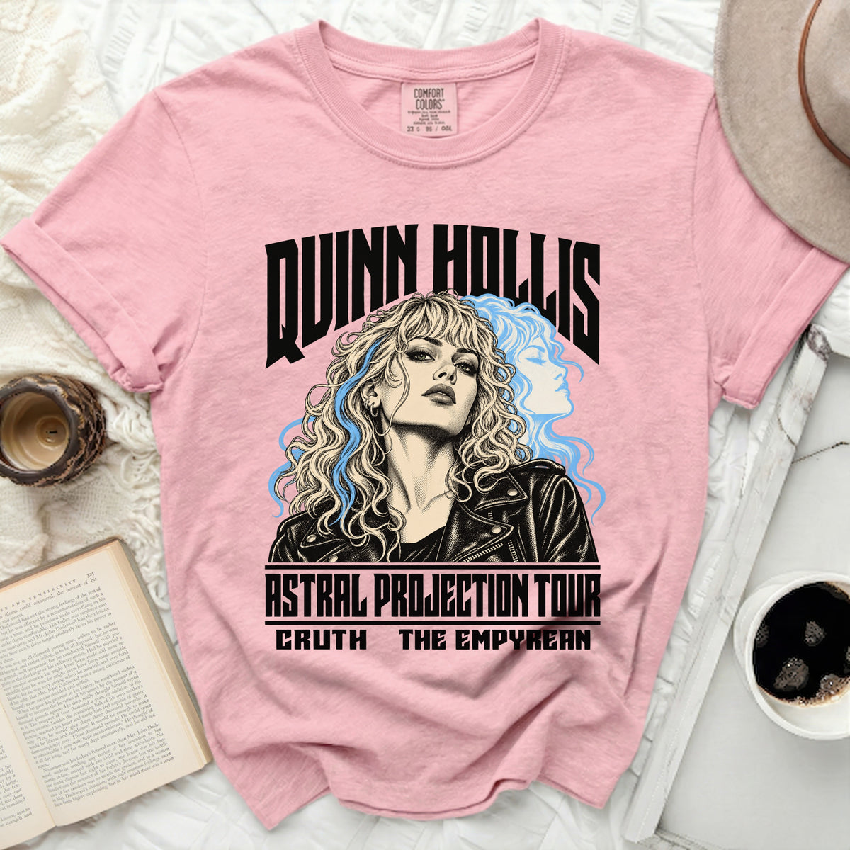 Pink t-shirt with Quinn Hollis Astral Projection Tour graphic and blue abstract artwork.