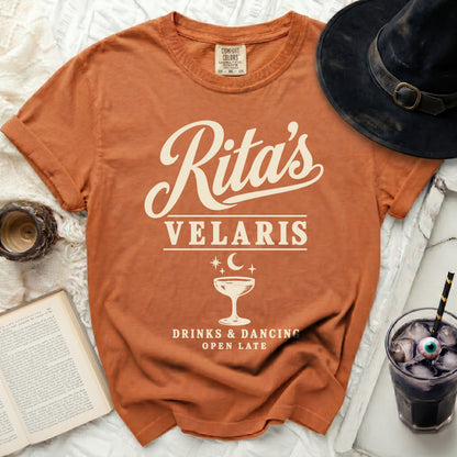Orange t-shirt with "Rita's Velaris Drinks & Dancing Open Late" text and graphic.