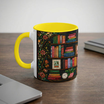 White mug with yellow handle, featuring a stained-glass-style bookshelf design with rose accents.