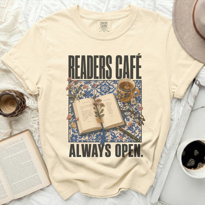 Cream t-shirt with "Readers Café Always Open" text and open book graphic.