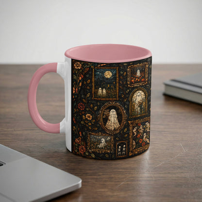 Mug with pink handle featuring framed ghost and pumpkin motifs in stained glass style.