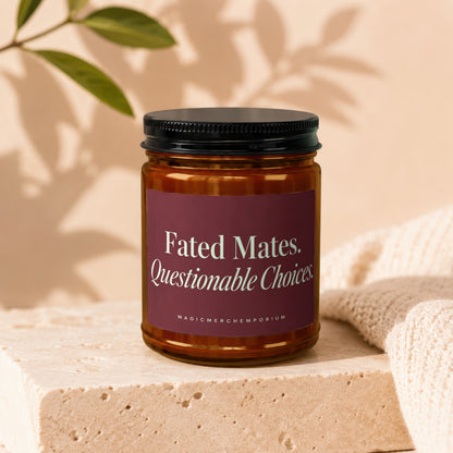 Amber jar candle with "Fated Mates, Questionable Choices" text and "MAGICMERCHEMPORIUM" logo.