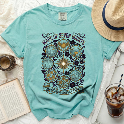 Teal t-shirt with "Made of Seven Courts" and "Feyre Archeron High Lady Prythian" text.