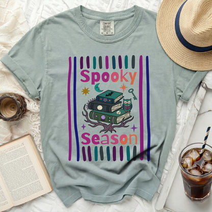 Light green t-shirt with "Spooky Season" text and Halloween graphics.