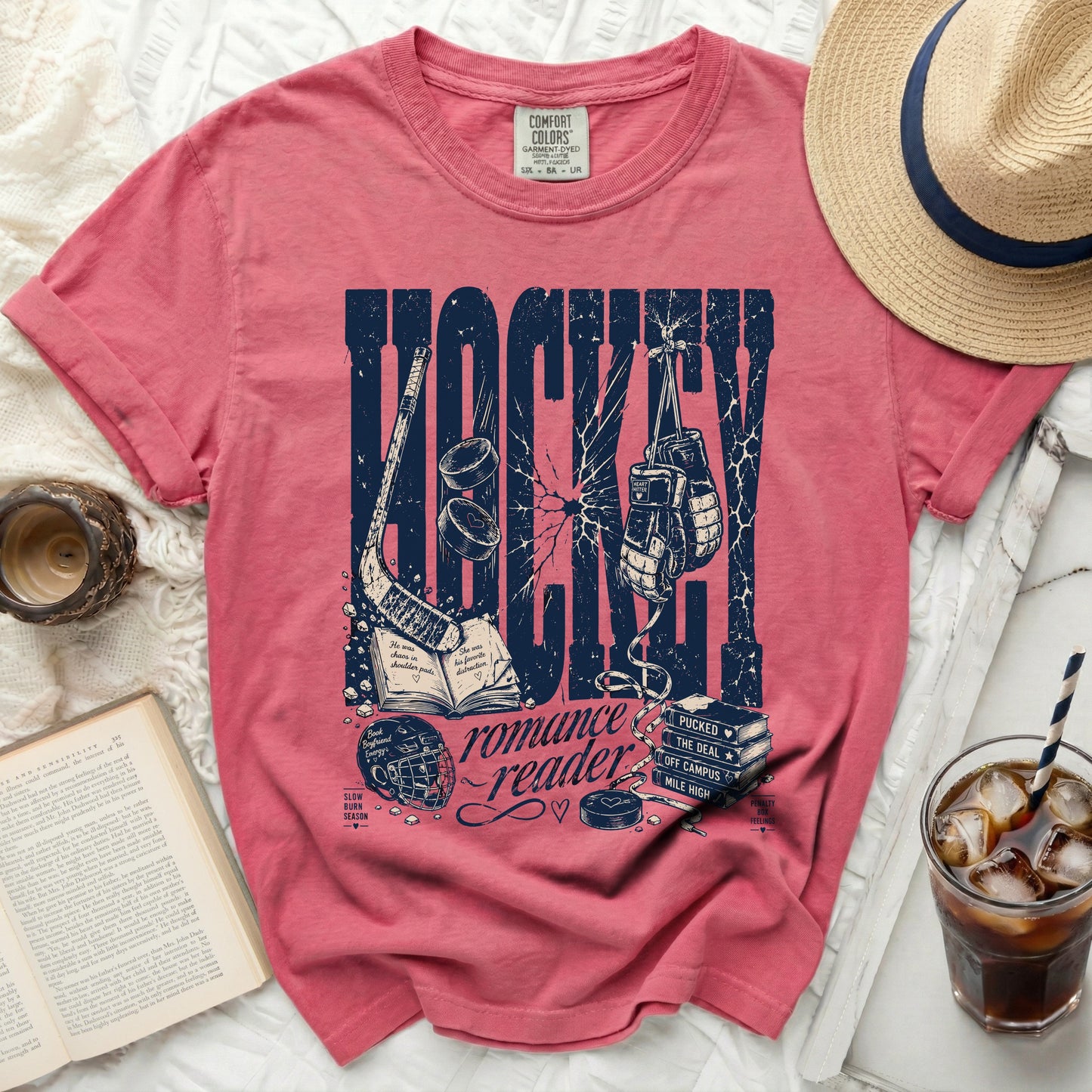 T-shirt with "Hockey romance reader" text and hockey imagery.