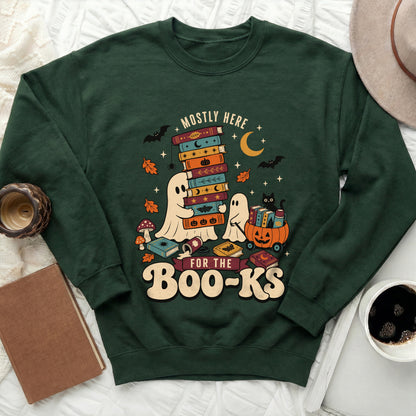 Green sweatshirt with ghosts, bats, moons, and "Mostly Here For The Boo-Ks" text.
