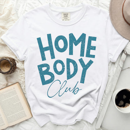 White t-shirt with "HOME BODY Club" text in distressed blue lettering.