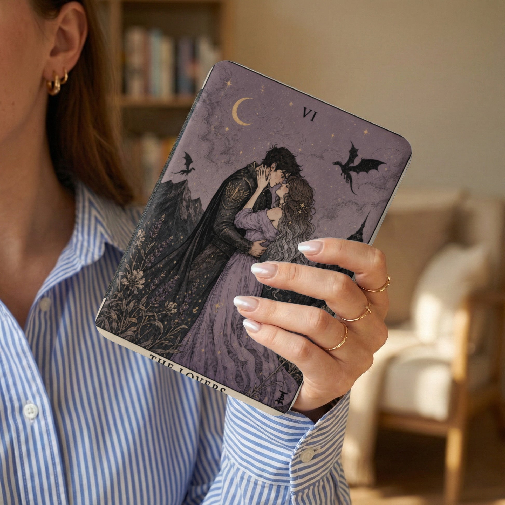 Book with "The Lovers" tarot card illustration and "VI" Roman numeral.