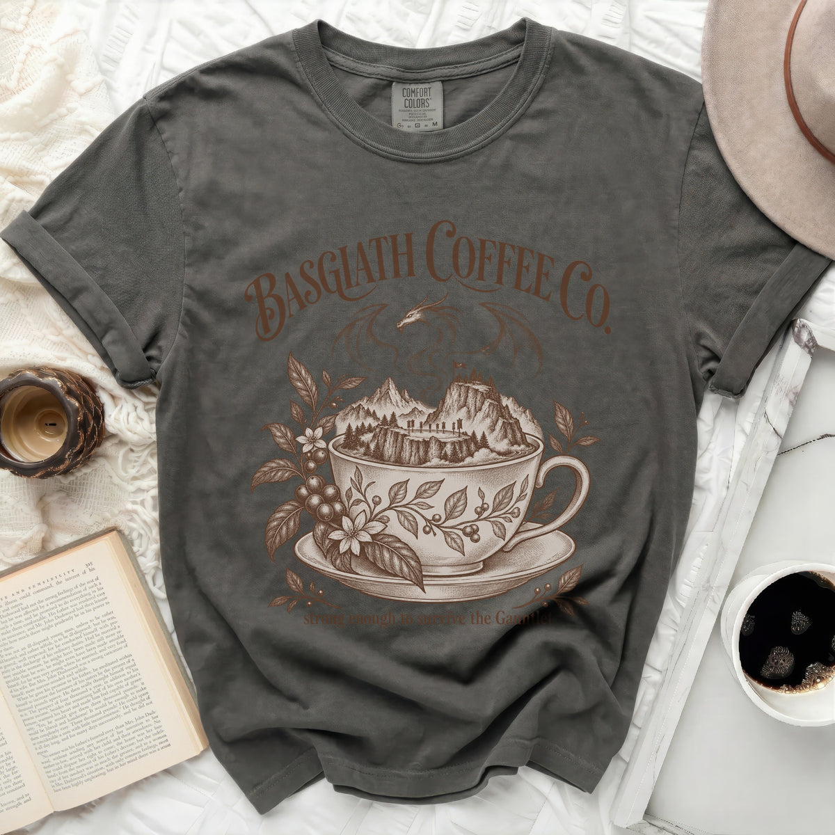 Charcoal t-shirt with "Basgiath Coffee Co." and a dragon over a coffee cup landscape.