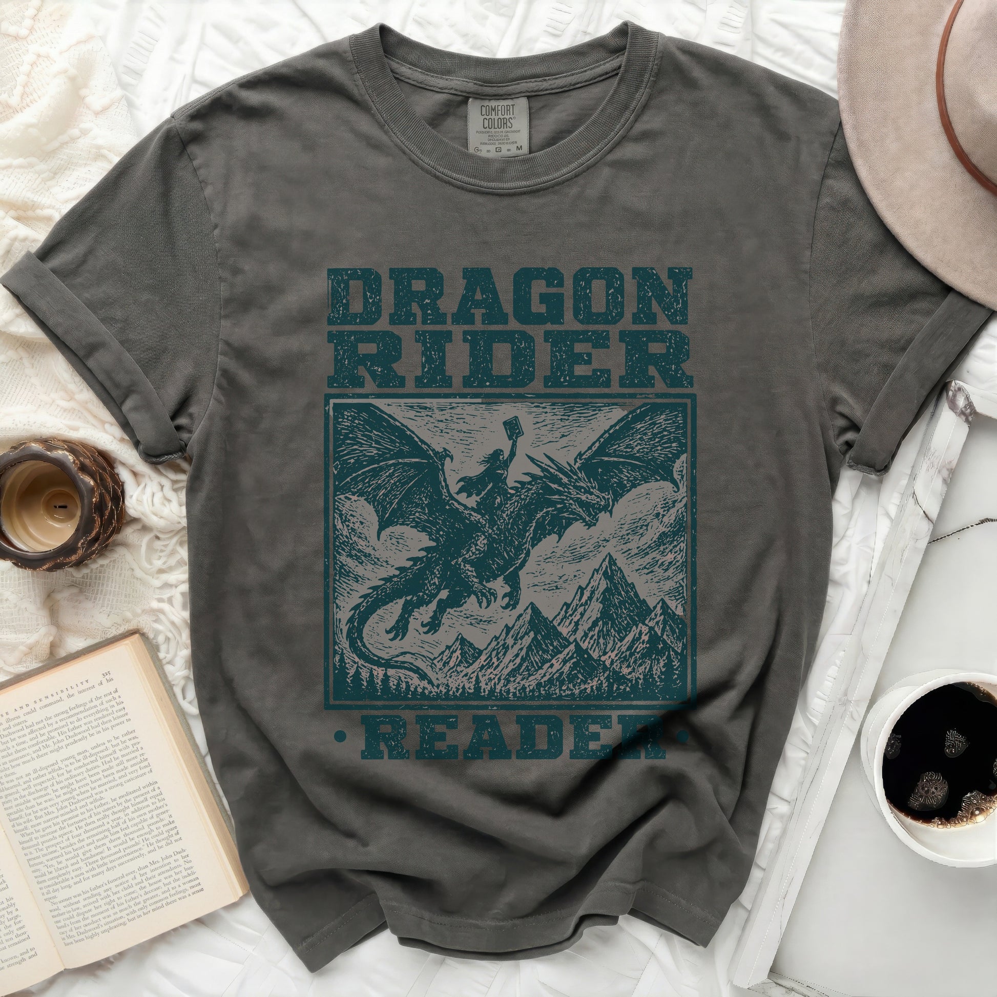 Dark grey t-shirt with "Dragon Rider Reader" text and illustration.