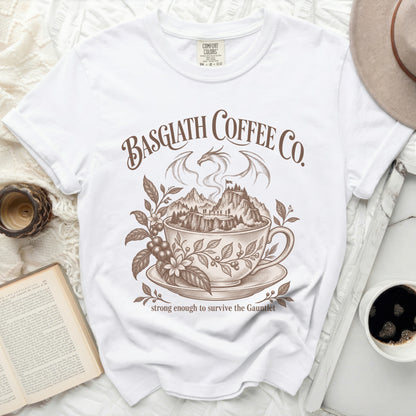 White t-shirt with Basgiath Coffee Co. dragon, mountains, and coffee cup design.